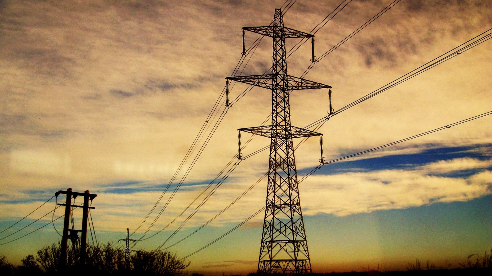 pylons sunset clouds photo by Kat Fry